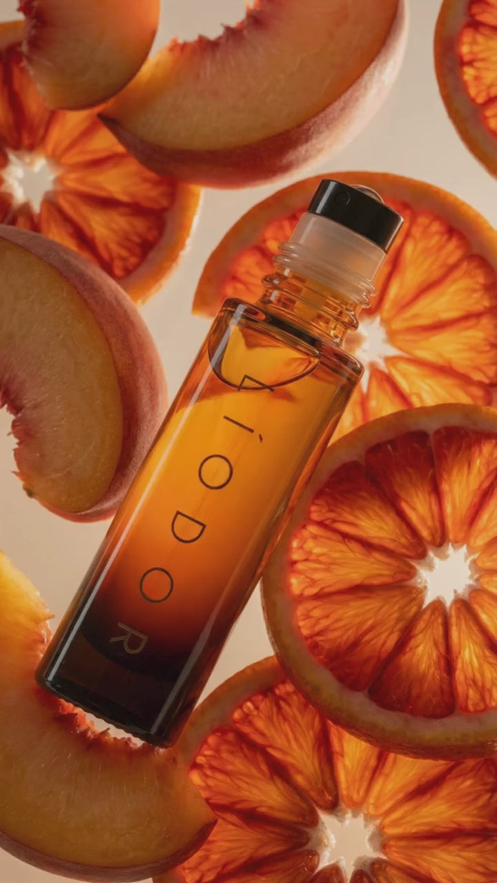 Person using perfume oil